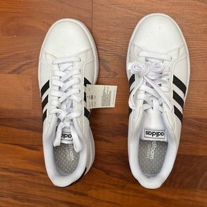 Black and white adidas's.